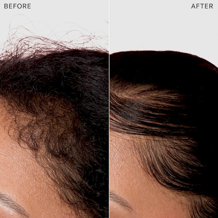 Woman moisturizing textured hair edges at home