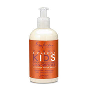 A pump bottle of Shea Moisture Mango & Carrot Kids Extra-Nourishing Conditioner for kids curly hair.