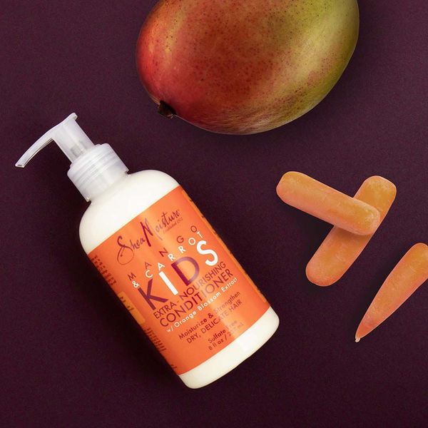 Lifestyle pic  Shea Moisture Mango & Carrot Kids Extra-Nourishing Conditioner for kids curly hair.